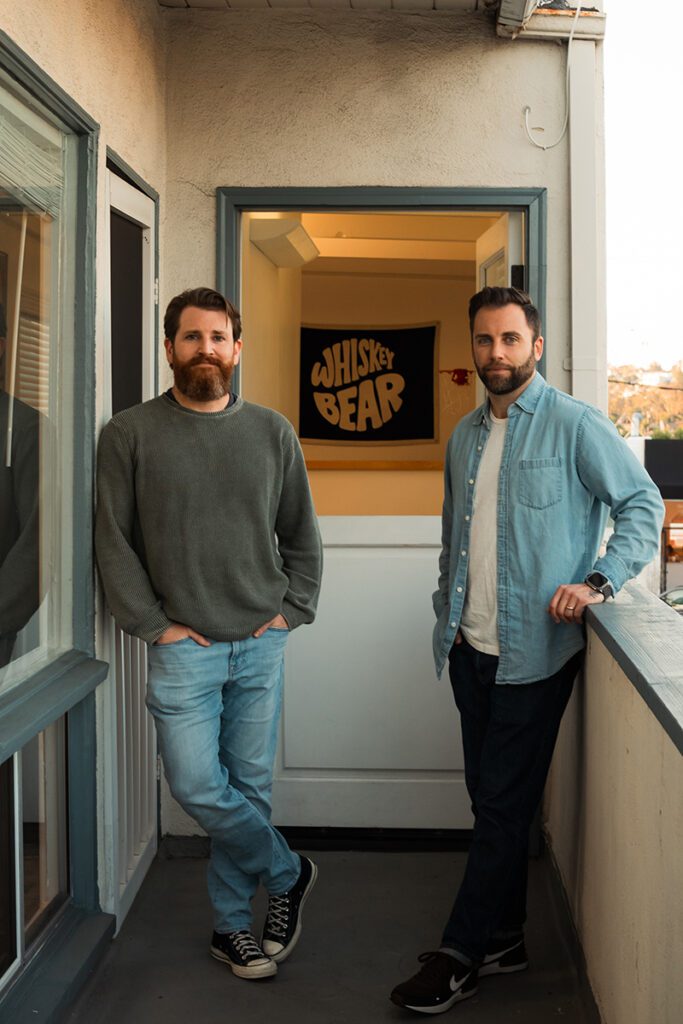Ben Murphy, ’08 (left), and Michael Tamburrino at the Whiskey Bear office in California