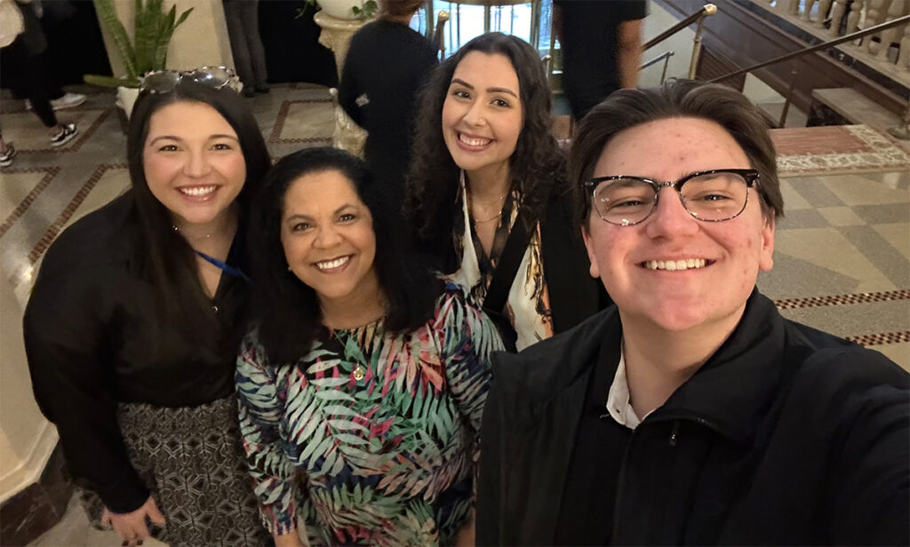 Assistant professor Dr. Elizabeth Falzone, NU trustee Denise Góñez-Santos, and TESOL program teacher candidates Amanda Ackley and Nick Endres.