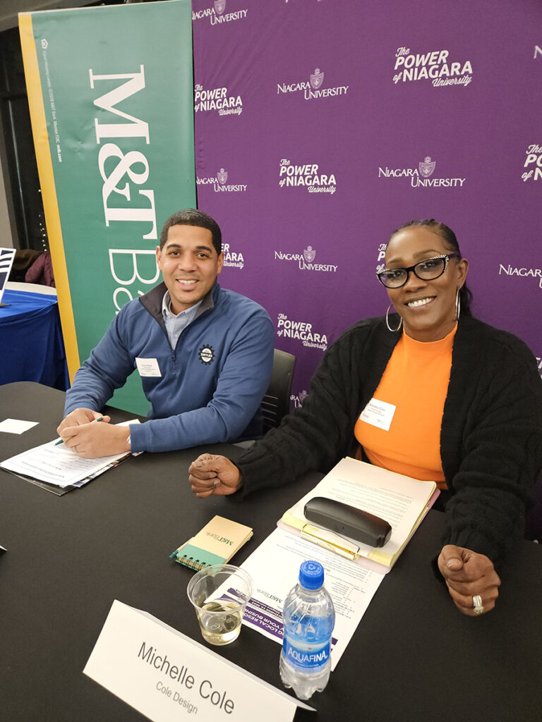 Niagara University alumnus Darius Myles, ’15, owner of DMyles General Construction, and Michelle Cole of ColeWorldDesignz, were two of the panelists at a networking event in December 2023 for minority- and women-owned business startups.