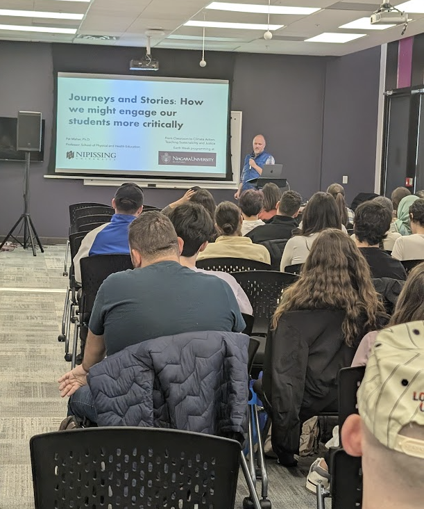 Dr. Patrick Maher giving a presentation