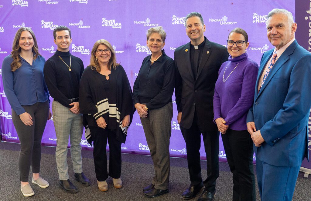Niagara University College of Nursing students Anna Shaw, ’25, and Josh Depoty, ’25; Dr. Rebecca Roloff, assistant professor of nursing; Dr. Denise Dunford, director of advanced practice environment at Kaleida Health; Rev. James J. Maher, C.M., president of Niagara University; Dr. Chris Verni, dean of the College of Nursing; and Joseph Ruffolo, president and CEO of Niagara Falls Memorial Medical Center, at the announcement of a new graduate program in family nurse practitioner on Feb. 13, 2024.