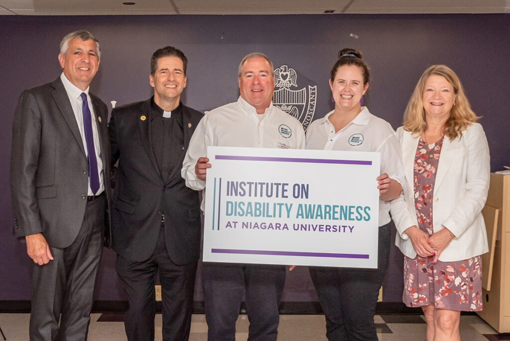 Scott Swagler, general manager of the Doubletree By Hilton Niagara Falls USA; Rev. James J. Maher, C.M., president of Niagara University; Dave Whalen and Dr. Carolyn Shivers, who will lead the Institute on Disability Awareness; and Karen McMahon, NYS Assemblymember.