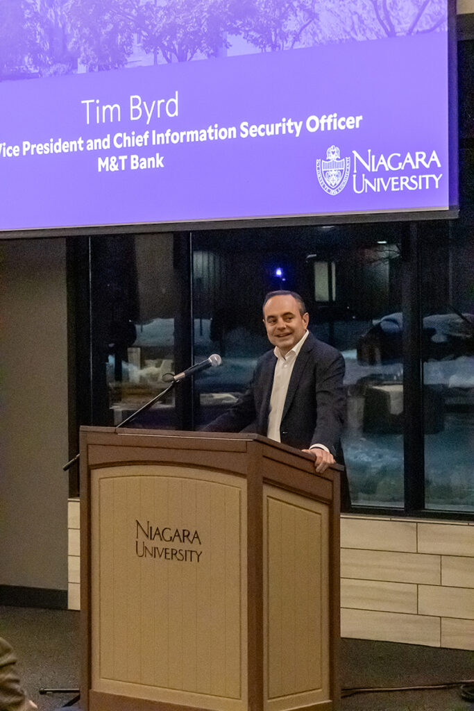 Industry leader Tim Byrd presenting at a podium