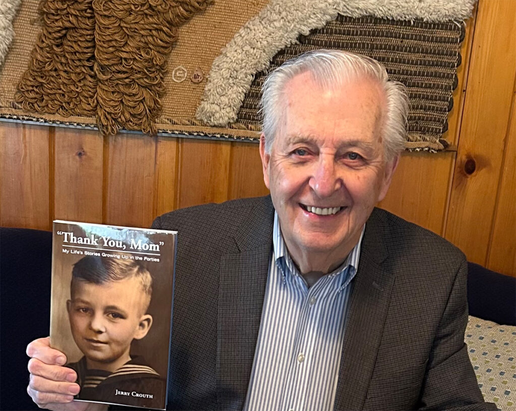 Jerry Crouth holding a book