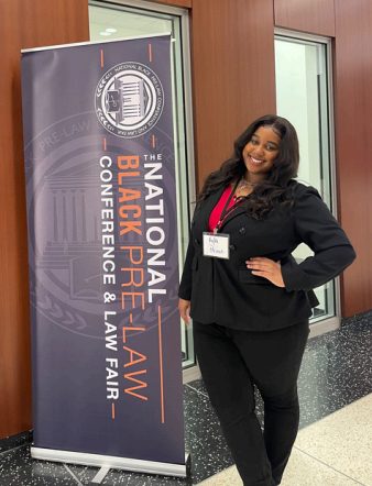 Kyla Prince, president of NU Peace Action NY, at the conference