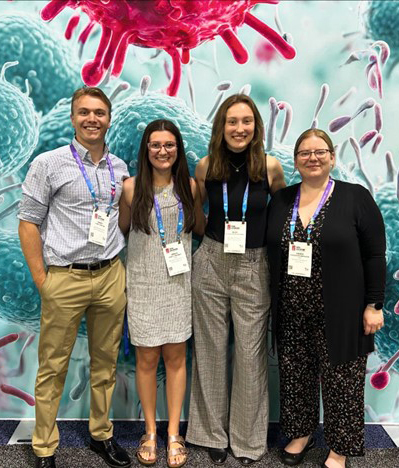 Casey O’Bryan, Grace Sweeney, Alexandra Kiedrowski, and Dr. Cassandra Marnocha at the American Society for Microbiology Microbe 2024 meeting at the Georgia World Congress Center in Atlanta, Ga., June 13-17, 2024.