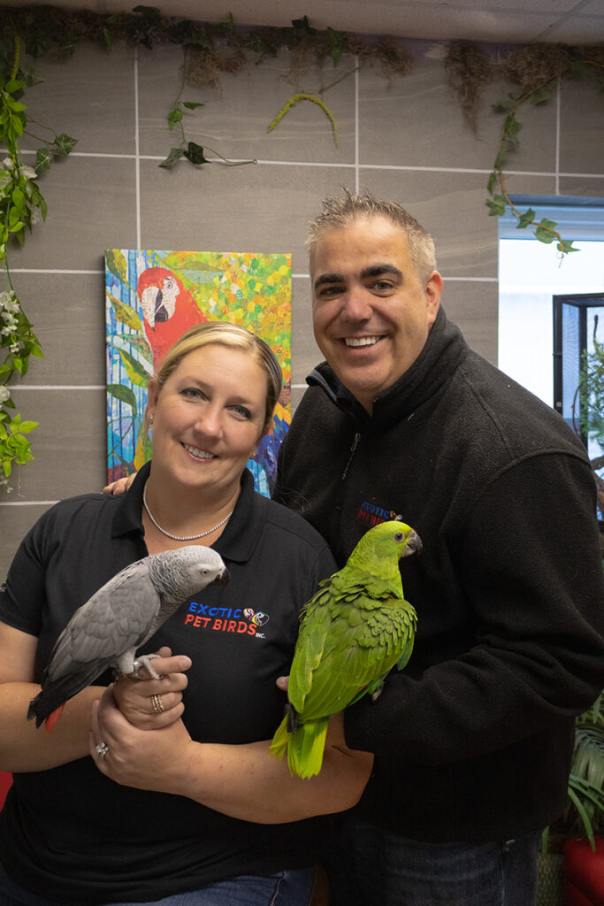 Sal and Jamie Salafia holding birds