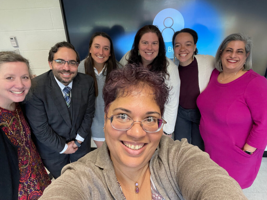 Shayna Myshrall with NU faculty members