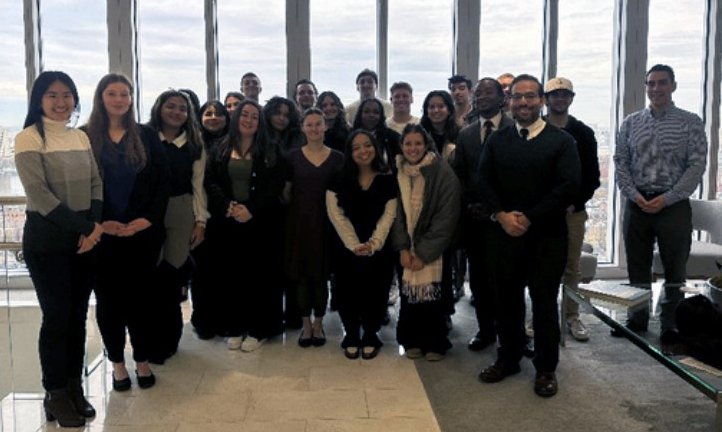 Students from Niagara University's pre-law program in a board room in boston