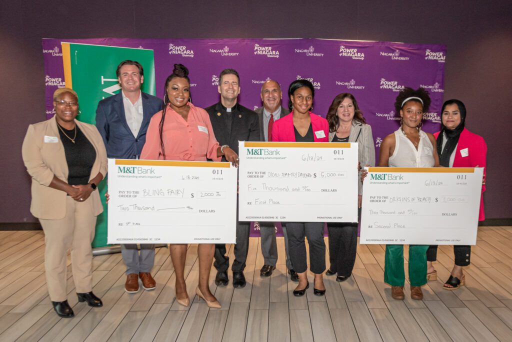 Tia Jackson, NUOP program director; Luke Woepple, M&T regional manager; Jessica Billingslea (The Bling Fairy); the Rev. James Maher, C.M., Niagara University president; Mark Laurrie, superintendent of the Niagara Falls City School District; Dasha Colvin (Orlori Family Daycare); Lucy Muto, M&T Bank vice president; Zahra Evans (Origins of Beauty); and NU alumna Nasreen Akhtar, ’07, MA’11, president of NAZ 716.