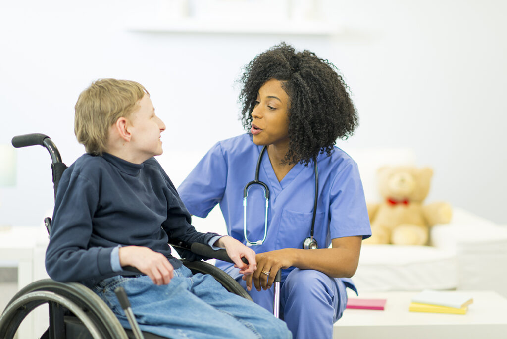doctor with patient with disabilities