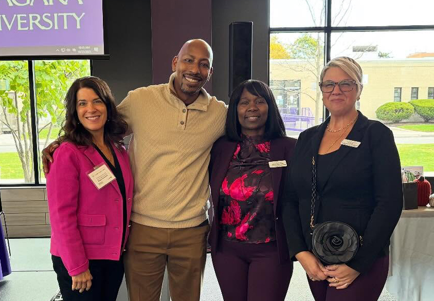 Four individuals at the 2025 Early Childhood Summit