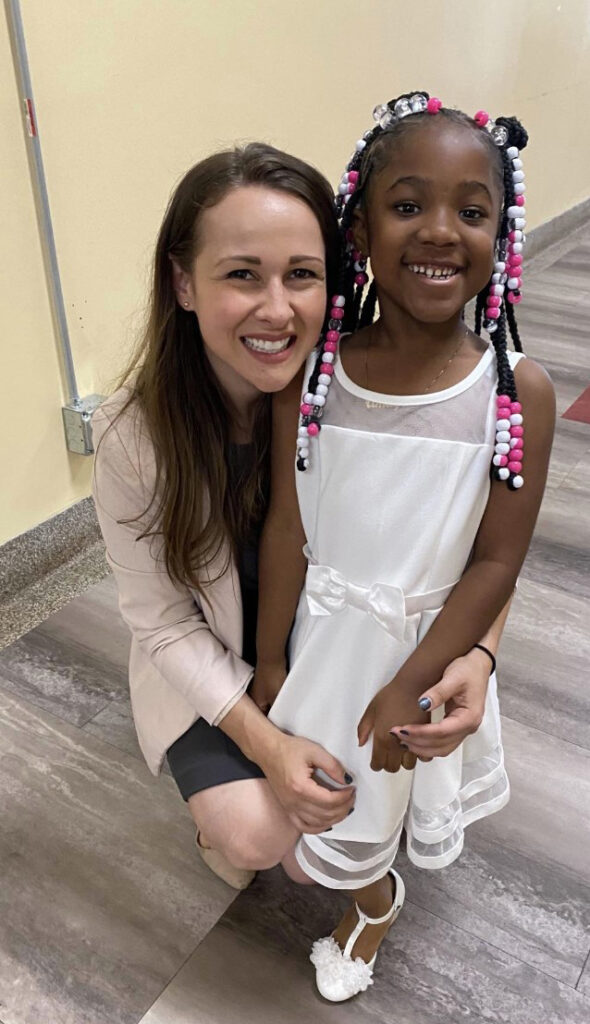 Brianna Lanoye, ’13, with one of her students at Buffalo Academy of Science Charter School 2.