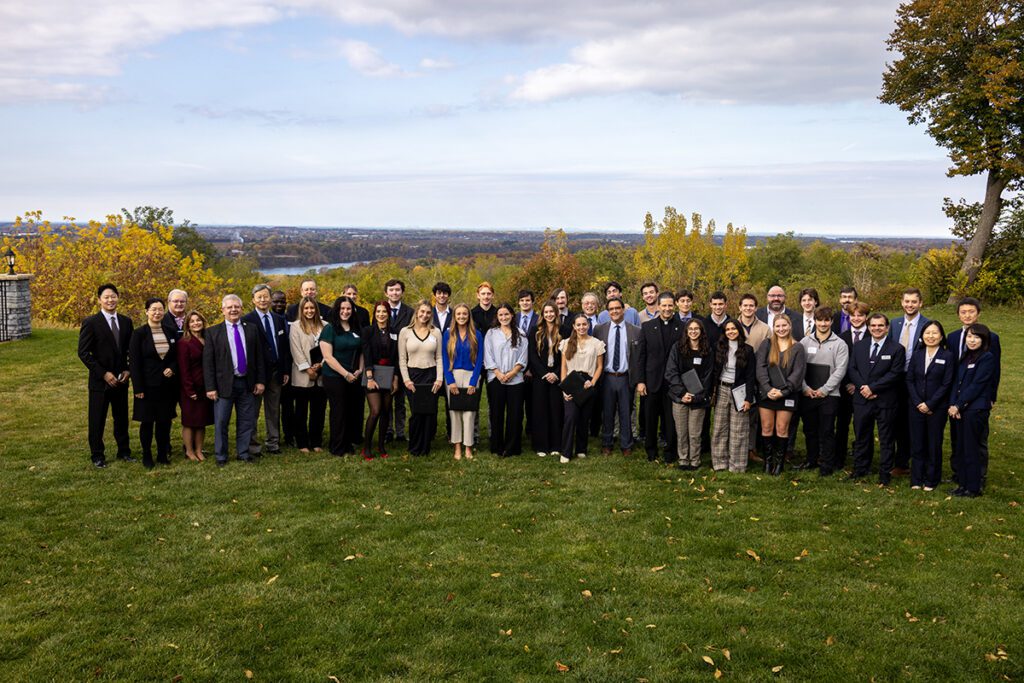 Group of business students on the lawn