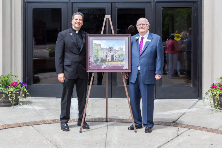 President of Niagara University with James Glynn in front of artist's rendering of new Glynn Hall on campus.