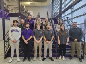 Group photo of the Niagara University group that is participating in Super Bowl events.