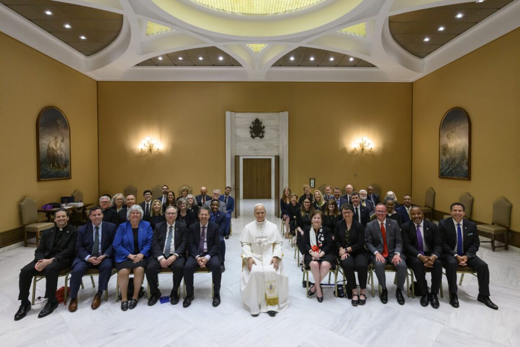 A delegation of North American Catholic higher education leaders is pictured with Pope Leo XIV.