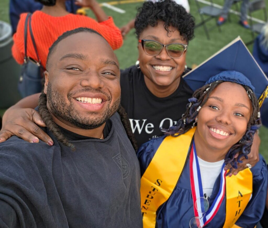 Qierra Gregory with family at her High School graduation